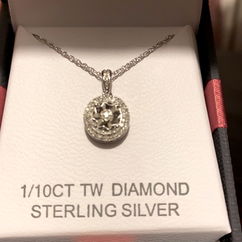 Diamond and sterling silver necklace.